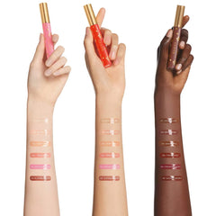 Gucci Gloss à Lèvres hydrating plumping lip gloss in multiple shades, displayed in a sleek tube with a shiny finish.