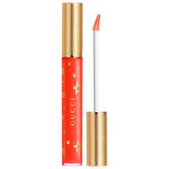 Gucci Gloss à Lèvres hydrating plumping lip gloss in multiple shades, new in box, with shiny, smooth lip gloss applicator.