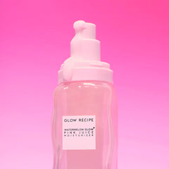 Glow Recipe Watermelon Pink Juice oil-free moisturizer in a refillable container, showcasing a vibrant pink product with fresh watermelon imagery.