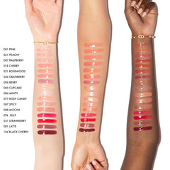 Dior Lip Glow Oil hydrating high-shine gloss in three finishes, displayed in a clear tube with a silver cap.