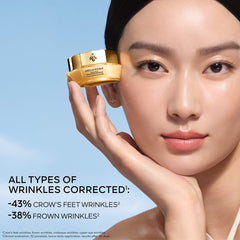 Guerlain Abeille Royale Youth Repair Eye Cream jar with gold accents, displayed on a neutral background.