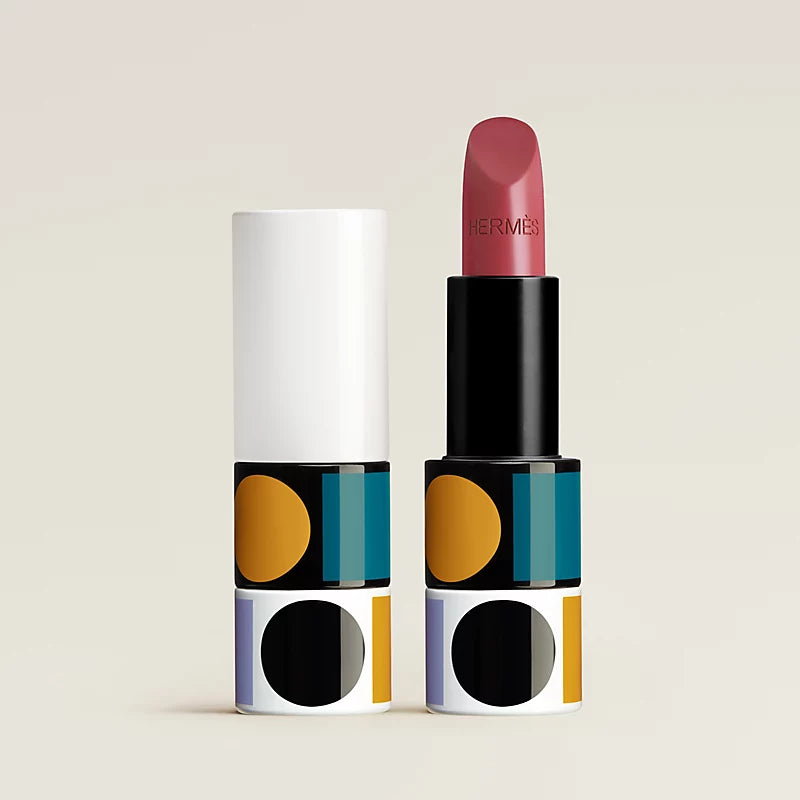 Hermès Rouge Hermès satin lipstick in Rose Mauve, 55, with elegant packaging and lipstick bullet visible.