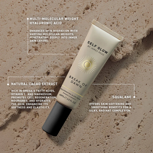 By James Read Break of Dawn Rejuvenating Glow Mask 60ml tube with a natural glow, resting on a rock.