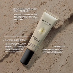 By James Read Break of Dawn Rejuvenating Glow Mask 60ml tube with a natural glow, resting on a rock.