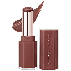 Fenty Beauty Gloss Bomb Stix high-shine lip gloss stick in a warm spice shade, displayed on a neutral background