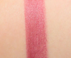 Tom Ford Boys & Girls Mini Lipsticks in Sterling, swatched on skin showing the shade's beige nude color and compact packaging.
