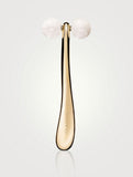 Clarins Precious Le Roll-On beauty product with a sleek silver rollerball applicator for targeted skincare.