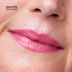 Clinique Pop Longwear Lipstick in various shades, new in box, with sleek white packaging and vibrant color swatches.